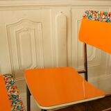 Pair of orange Formica "Tublac" chairs