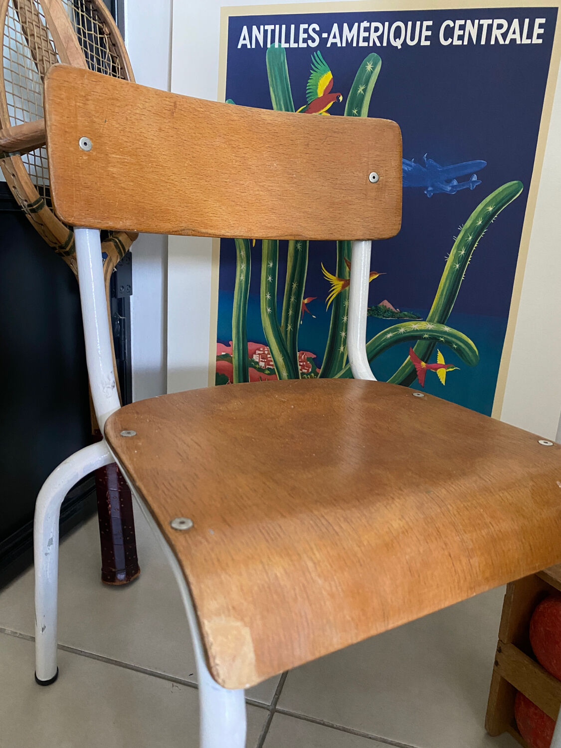 Old wooden and metal children's school chair