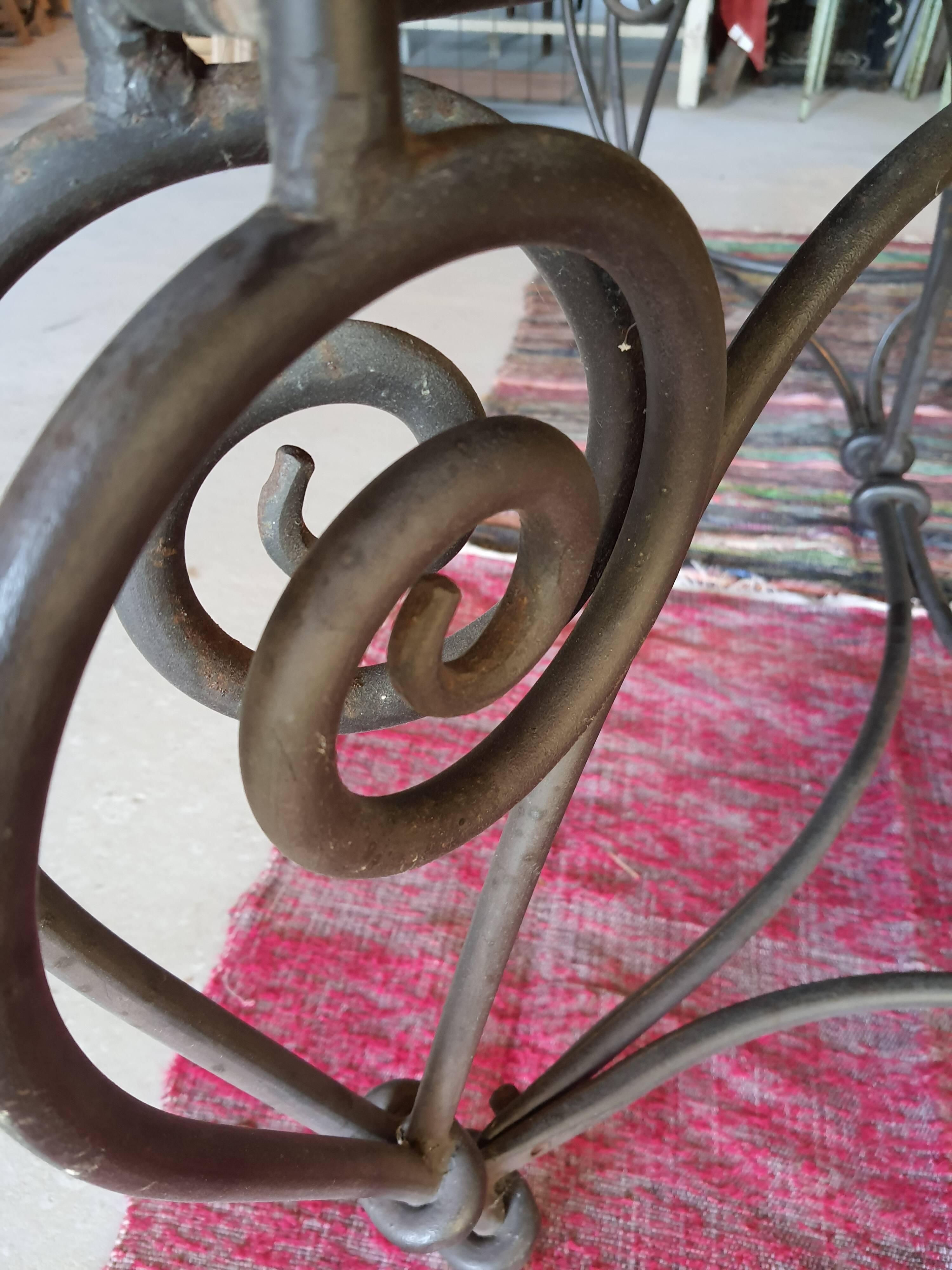 Wooden and wrought iron table
