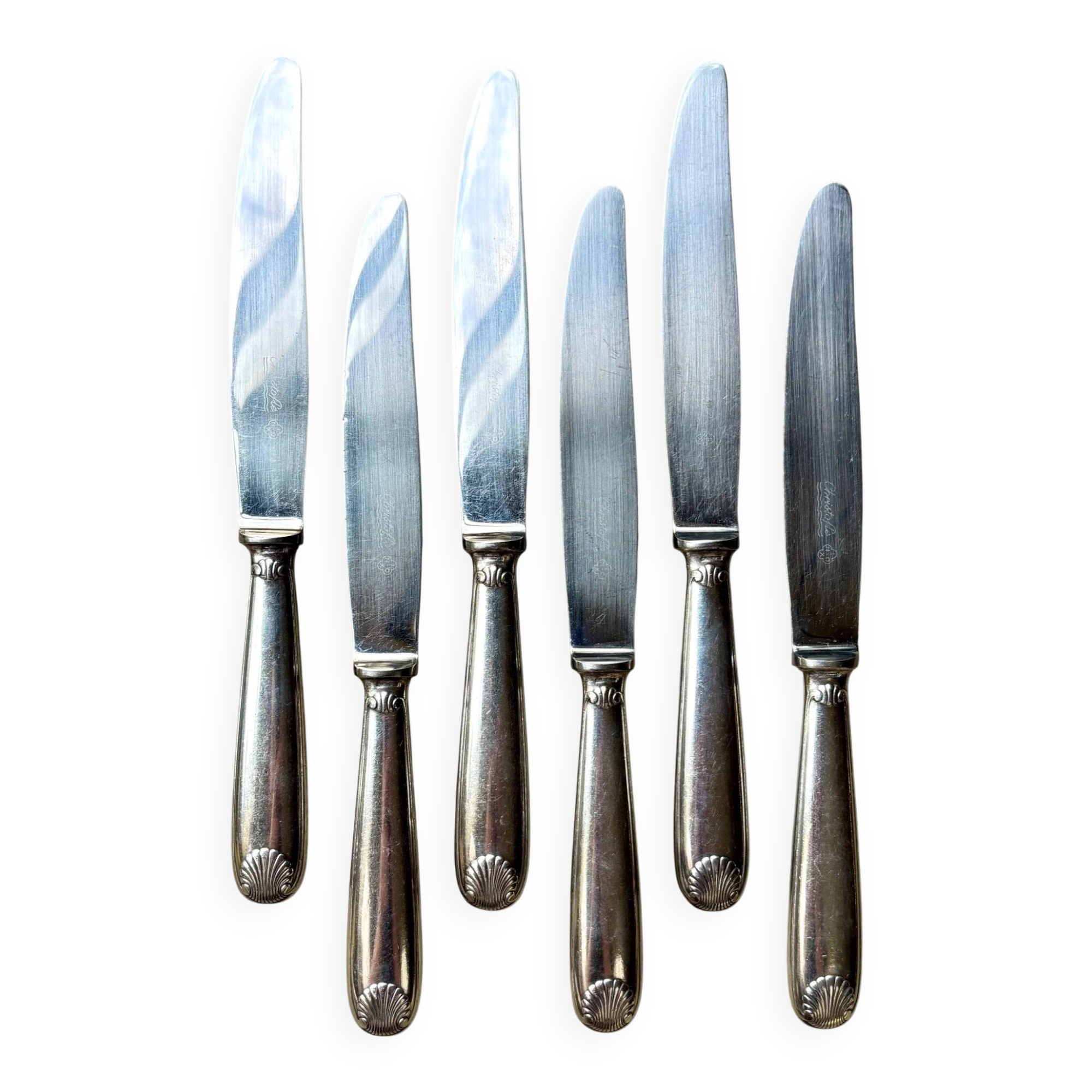 6 Christofle knives in silver-plated metal, shell design.
