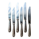 6 Christofle knives in silver-plated metal, shell design.