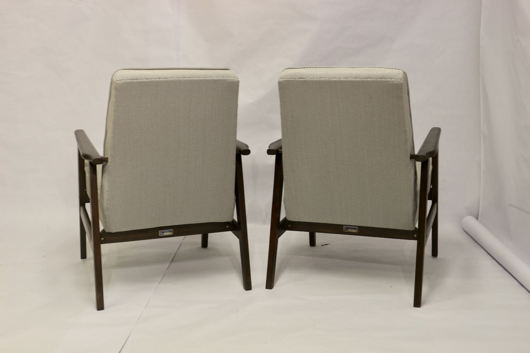 Pair of Henryk Lis armchairs 300-190s 1970s reupholstered gray textured fabric.