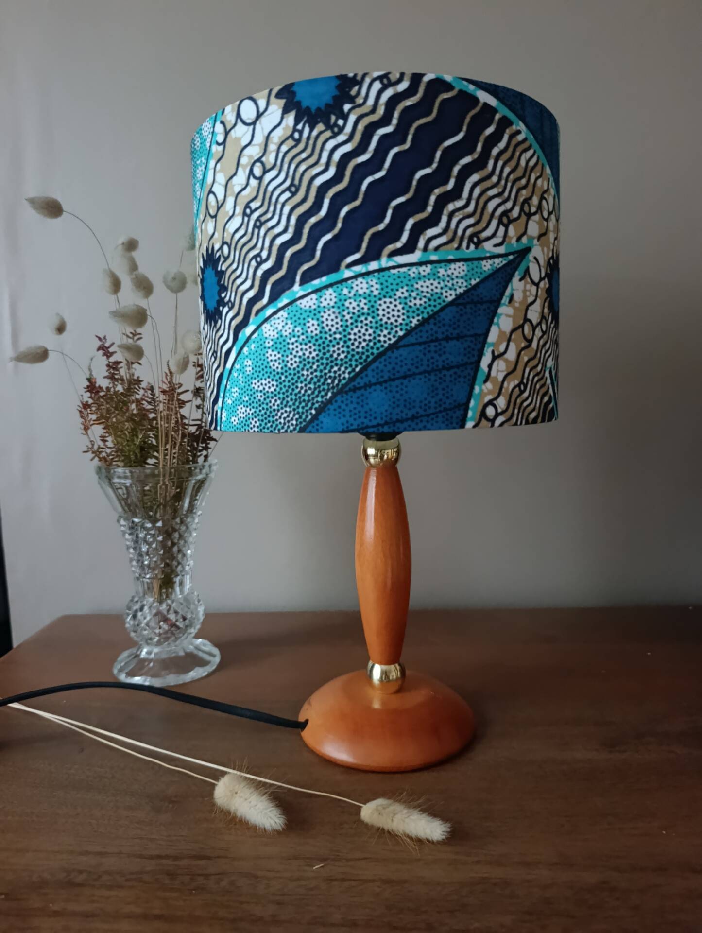 Mid-century wooden table lamp, blue wax lampshade.