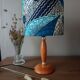 Mid-century wooden table lamp, blue wax lampshade.