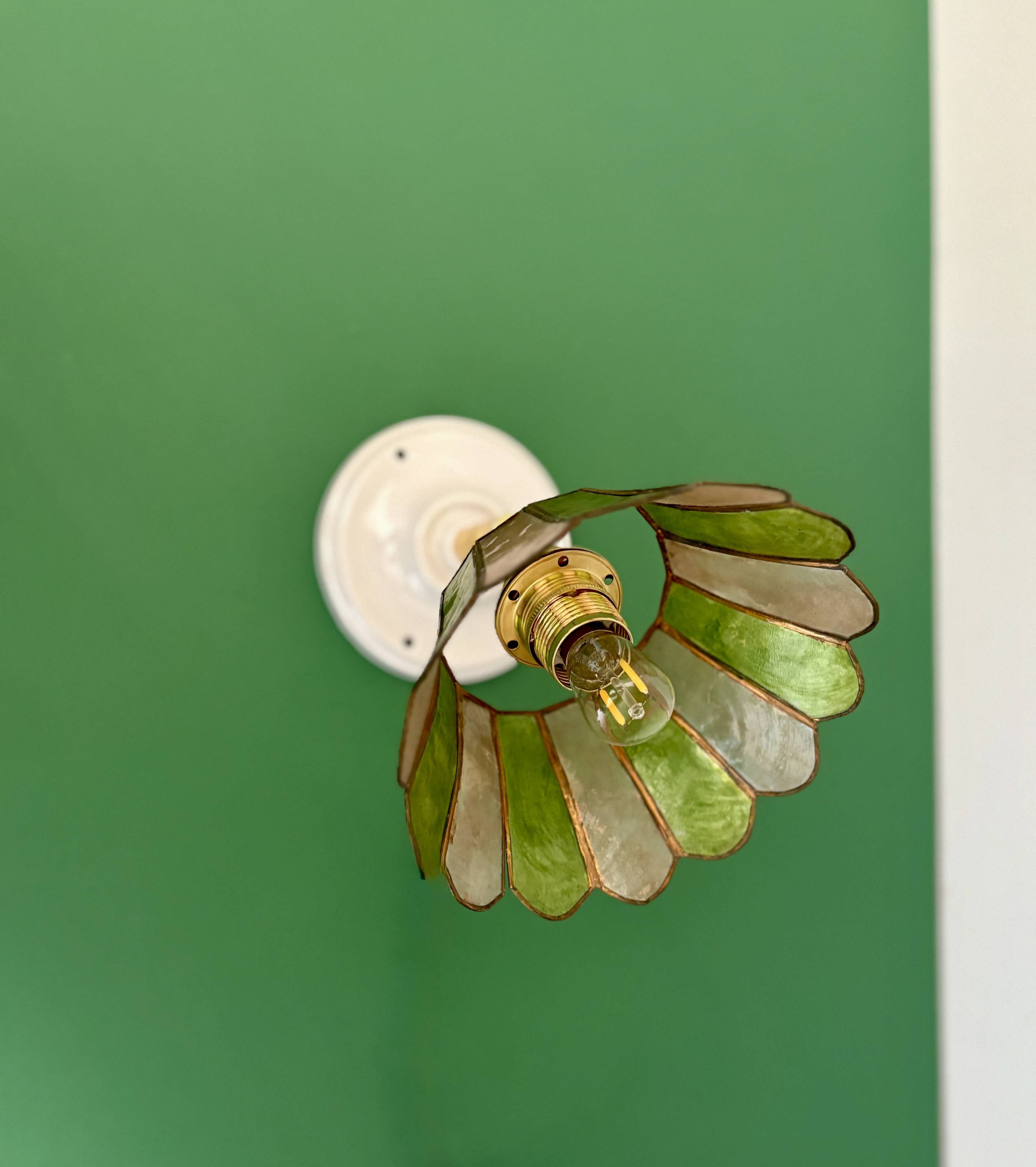 Vintage wall lamp with a green and pink mother-of-pearl lampshade