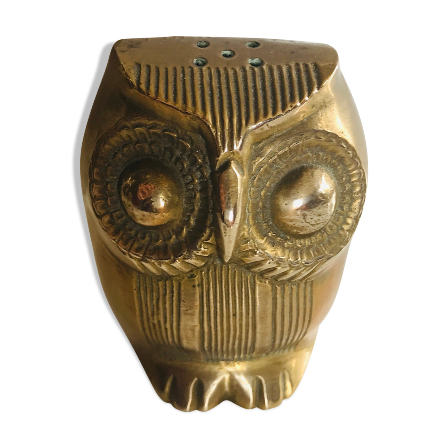 Brass owl wears incense