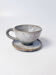 Handcrafted stoneware cup and its saucer – Speckled glaze