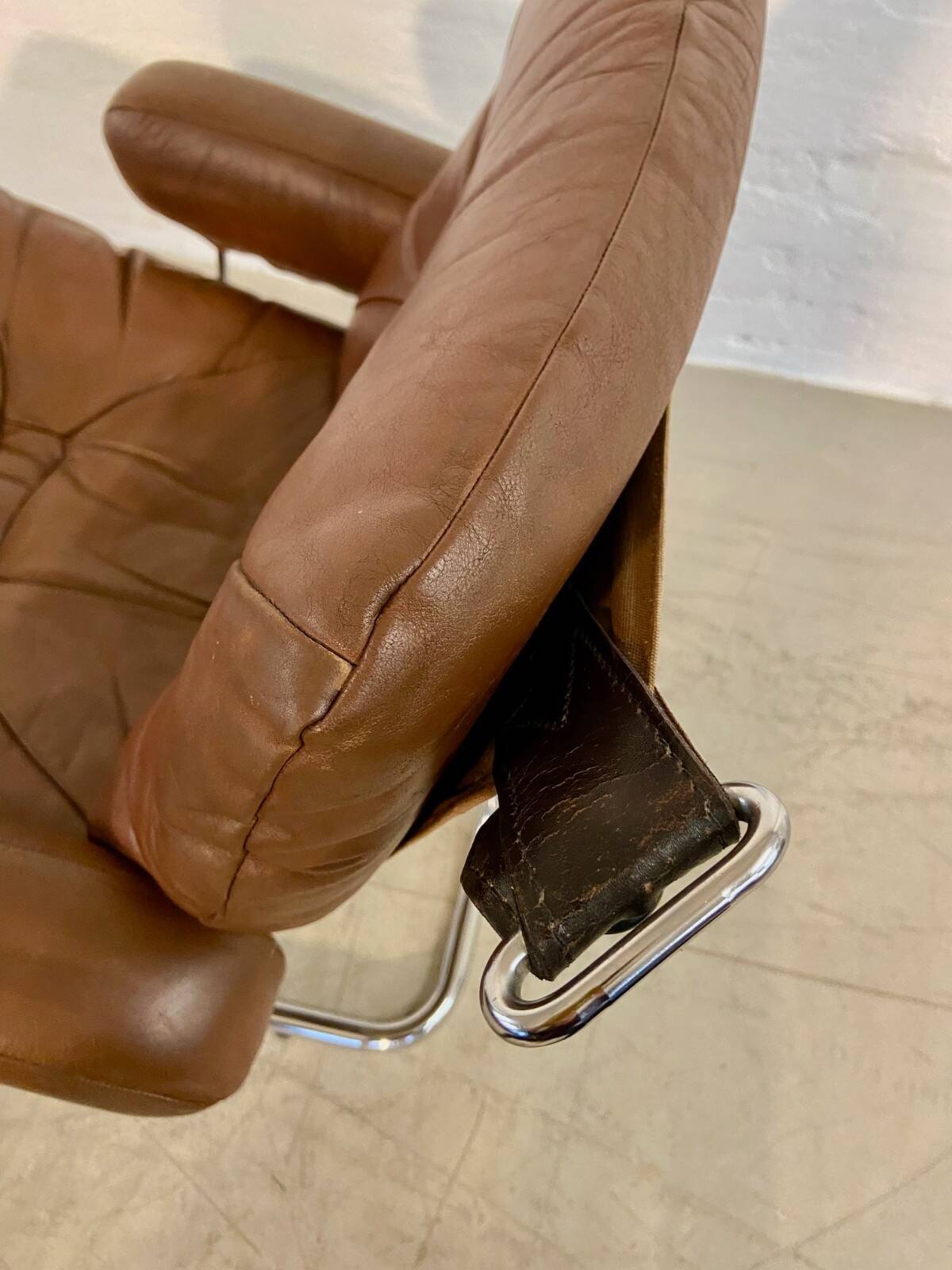 Vintage mid-century Scandinavian cognac leather lounge chair by Harald Relling