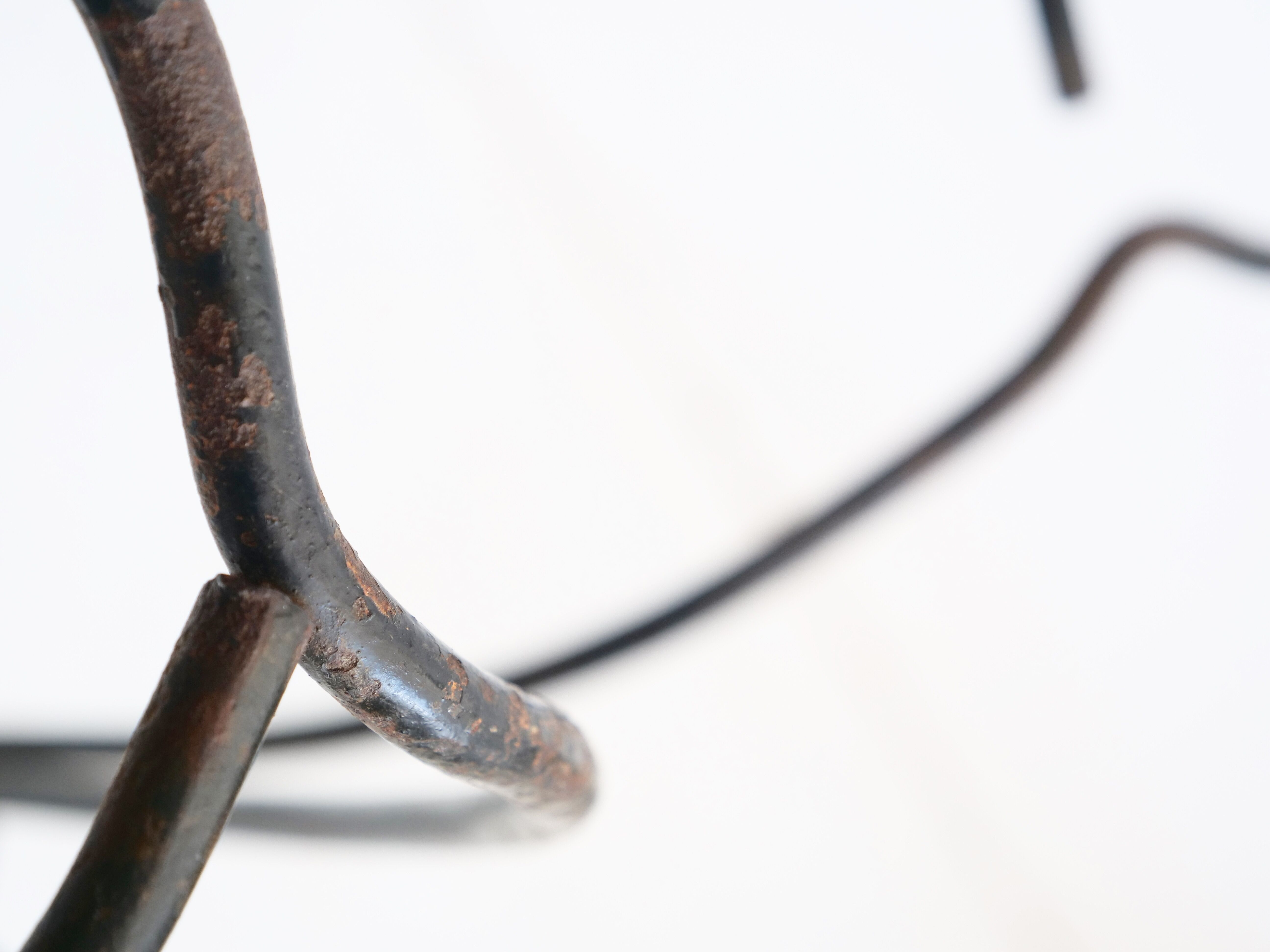 Arched steel flowered foot for balconies and terraces
