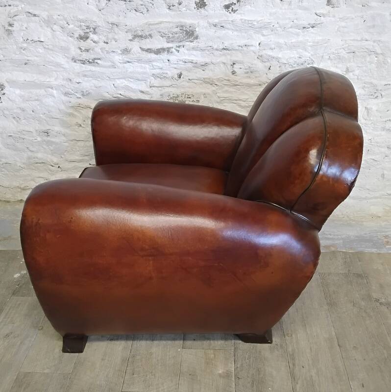 Club chair with floral backrest