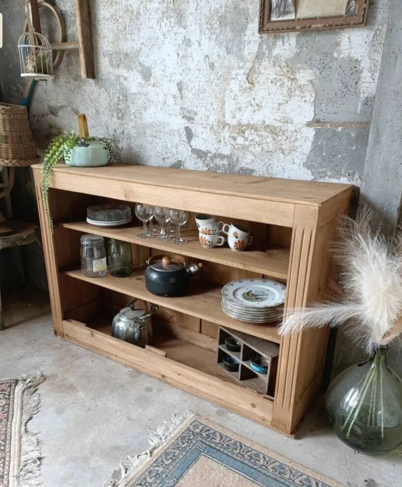 Open wooden chest of drawers