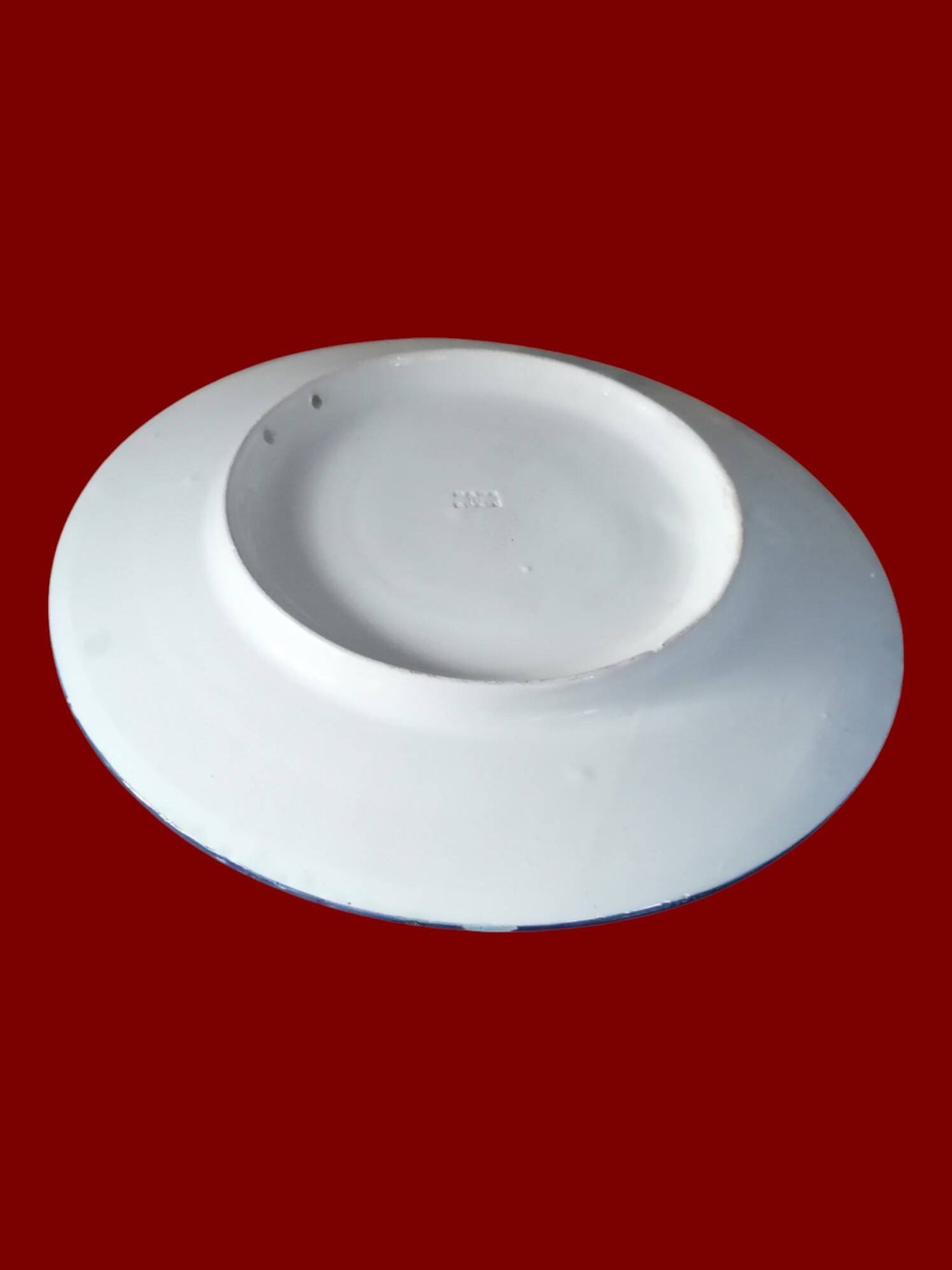 Grand plat rond en faience d'ibiza.