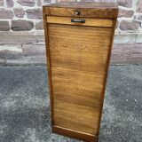 Sliding curtain binder cabinet