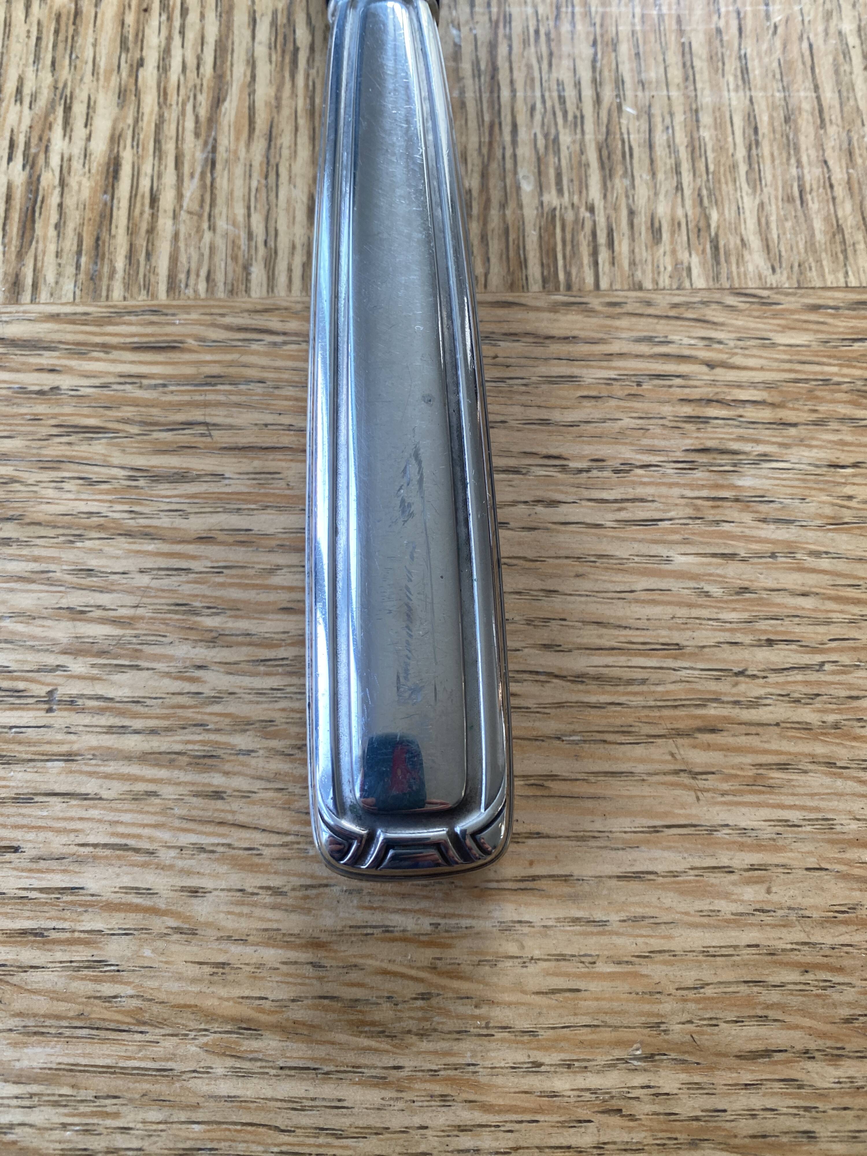 Art Deco silver metal leg of lamb cutlery