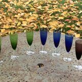 Set of 7 champagne flutes in colored glass and transparent base, vintage