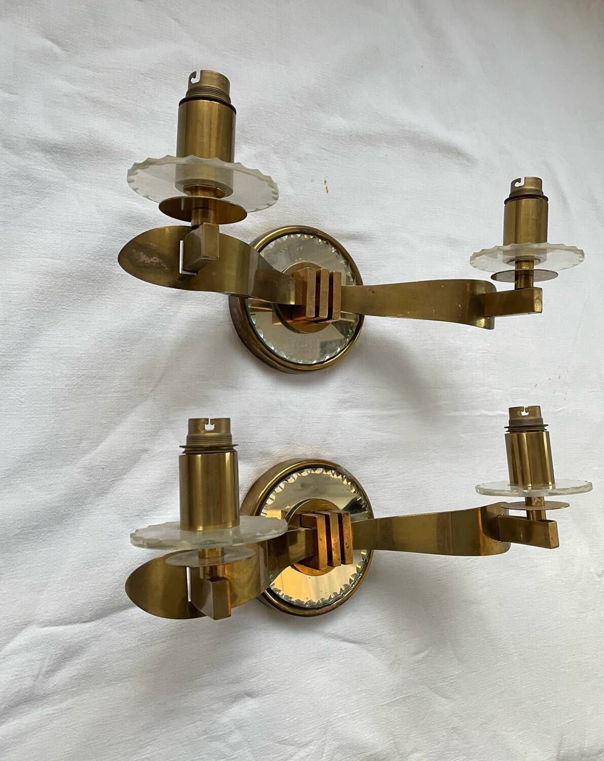 Vintage pair of art deco brass and mirrored glass wall lights France 1940