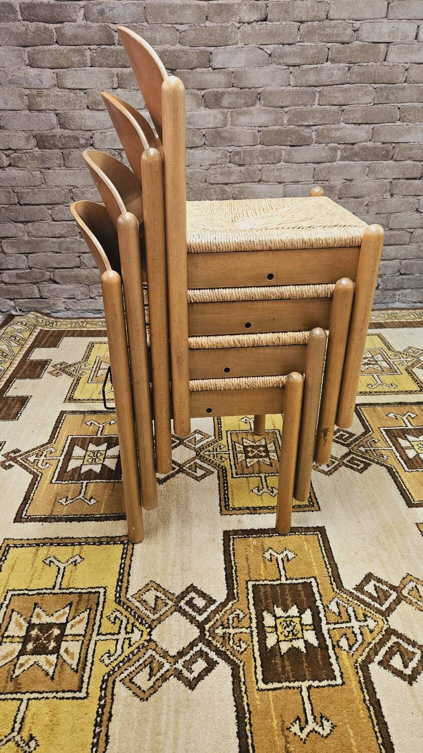 4 straw chairs in the vintage Charlotte Perriand 1970 style