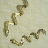 Pair of golden snakes