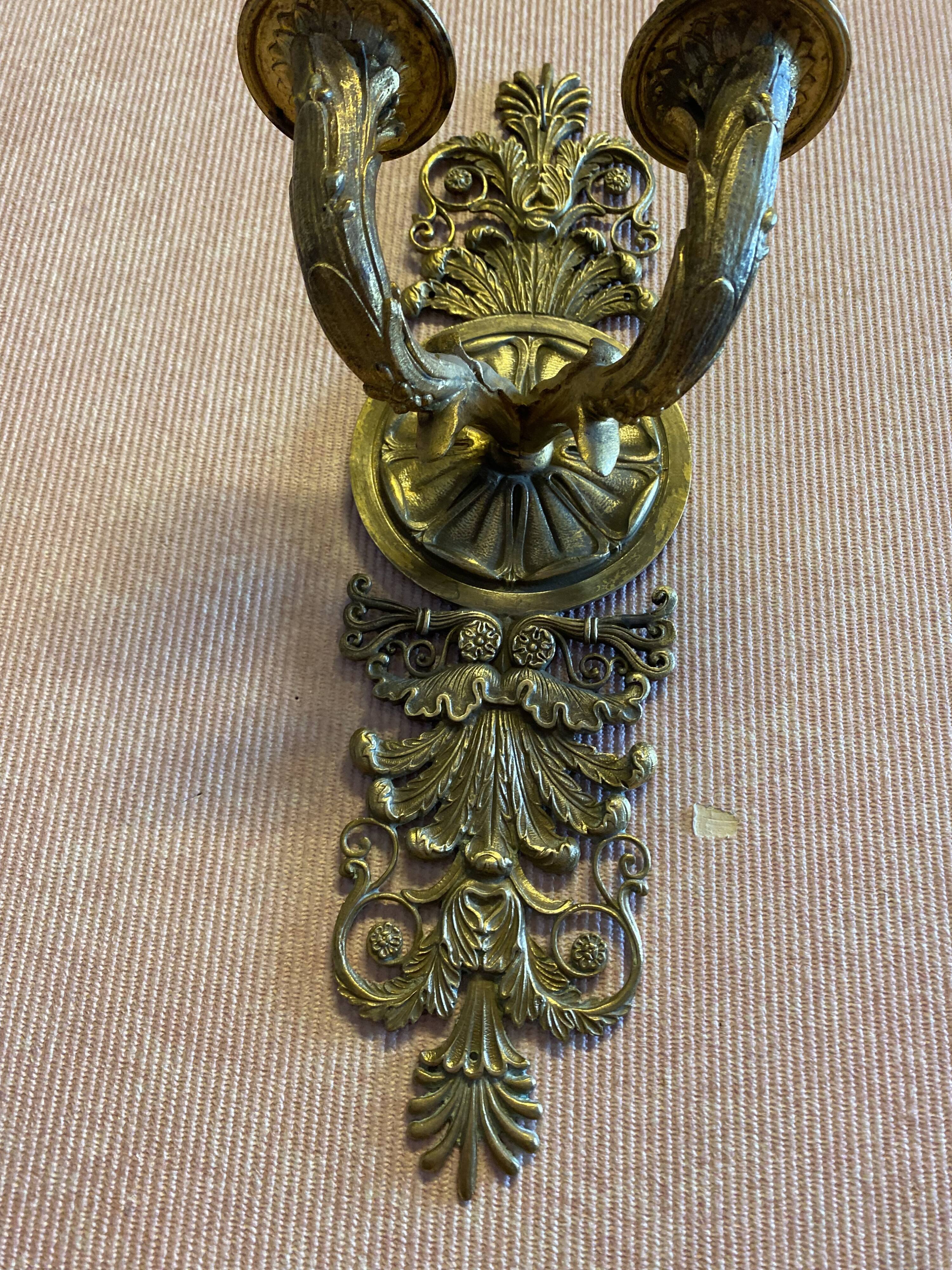 Pair of gilded bronze sconces, 2 burners, Restoration style.