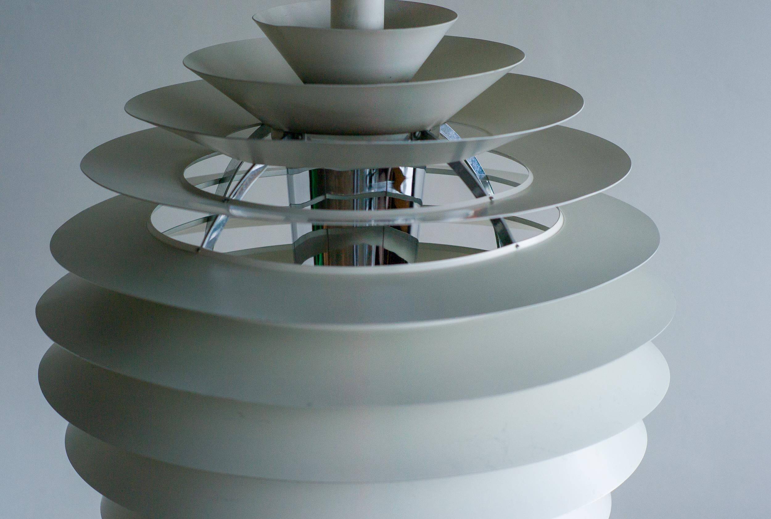 Large pendants from the early last century from the Louvre by Poul Henningsen for Louis Poulsen, 1962.
