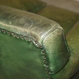 Victorian leather canapé, shield armrests, stamped Maple & Co.