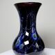 Large vintage purple art glass vase with silver glitter inclusions.