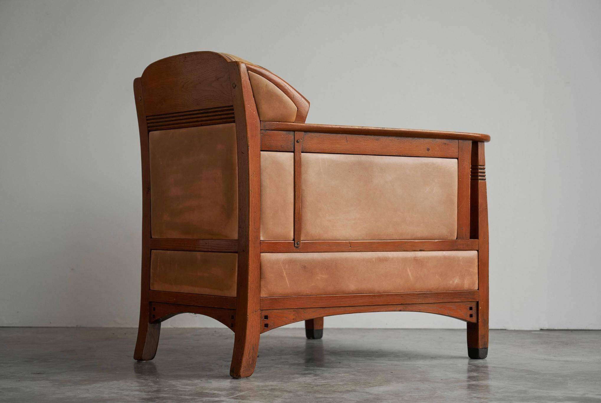 Art Deco armchair in solid oak and leather by Frits Schuitema