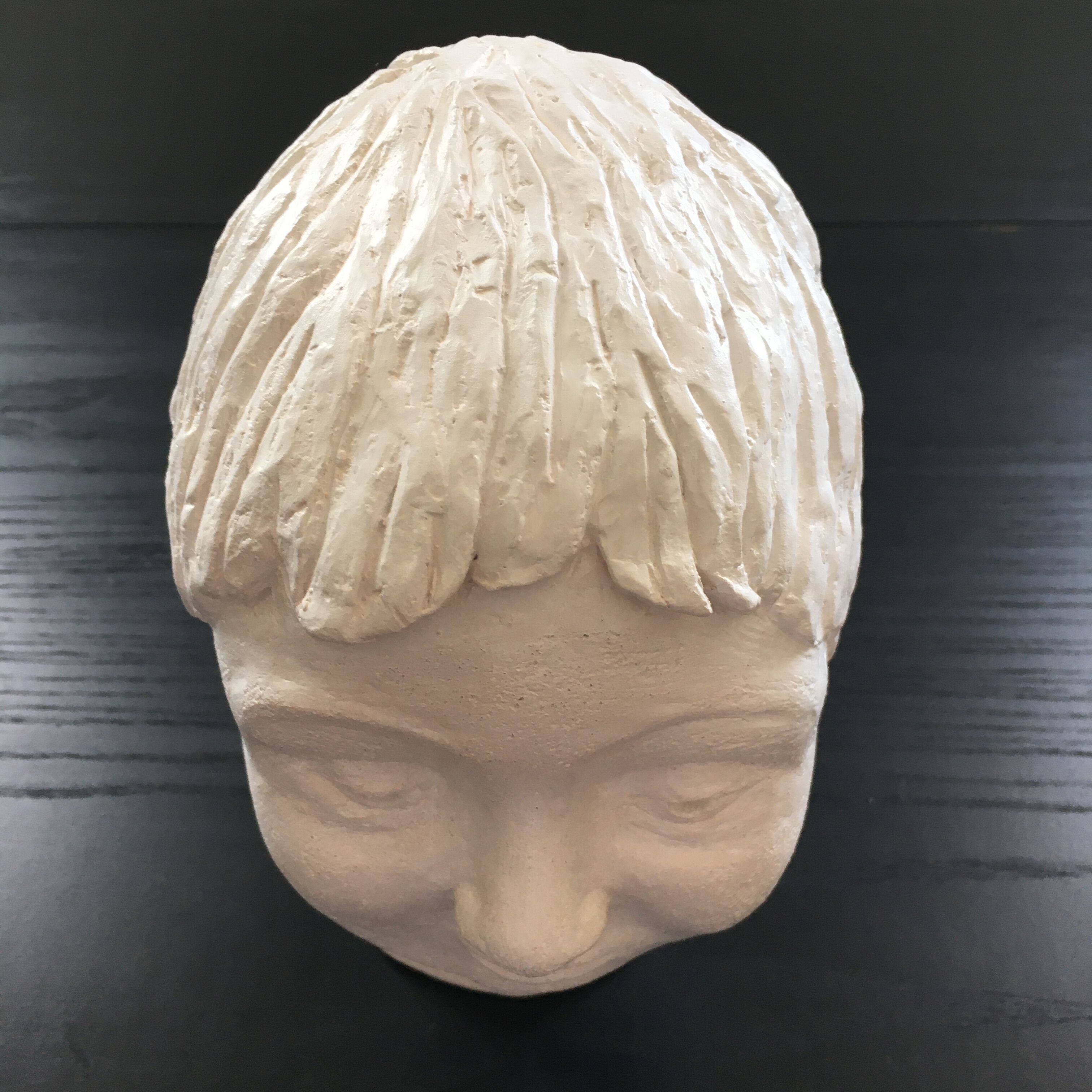 Plaster girl's head