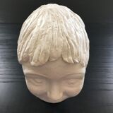 Plaster girl's head