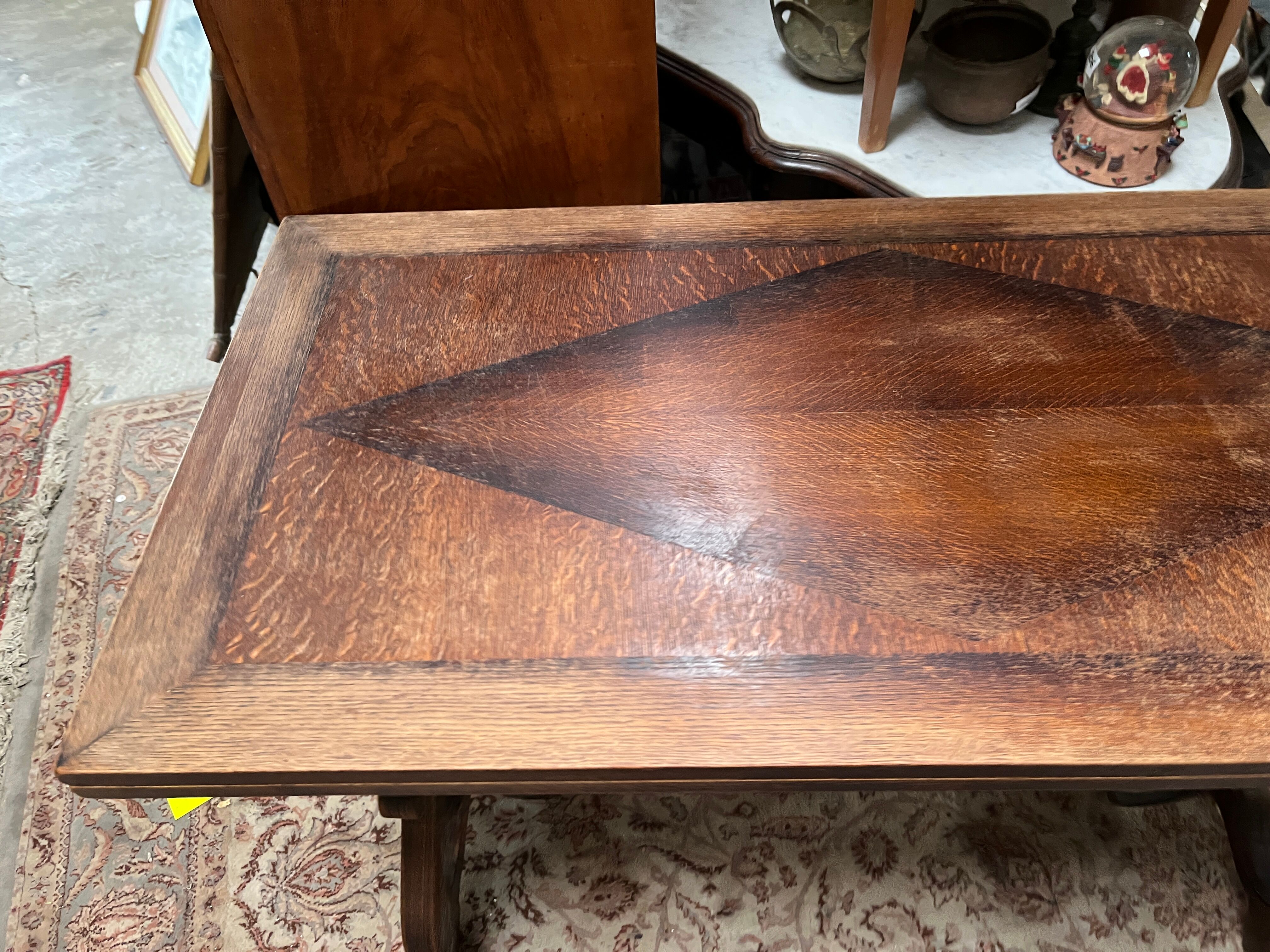 Spanish style table in carved wood and wrought iron