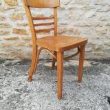 12 varnished bistro chairs