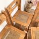 Ensemble de 4 chaises en bois et cannage - années 1960-70