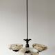 Art Deco bronze three-arm chandelier with marbled glass shades.