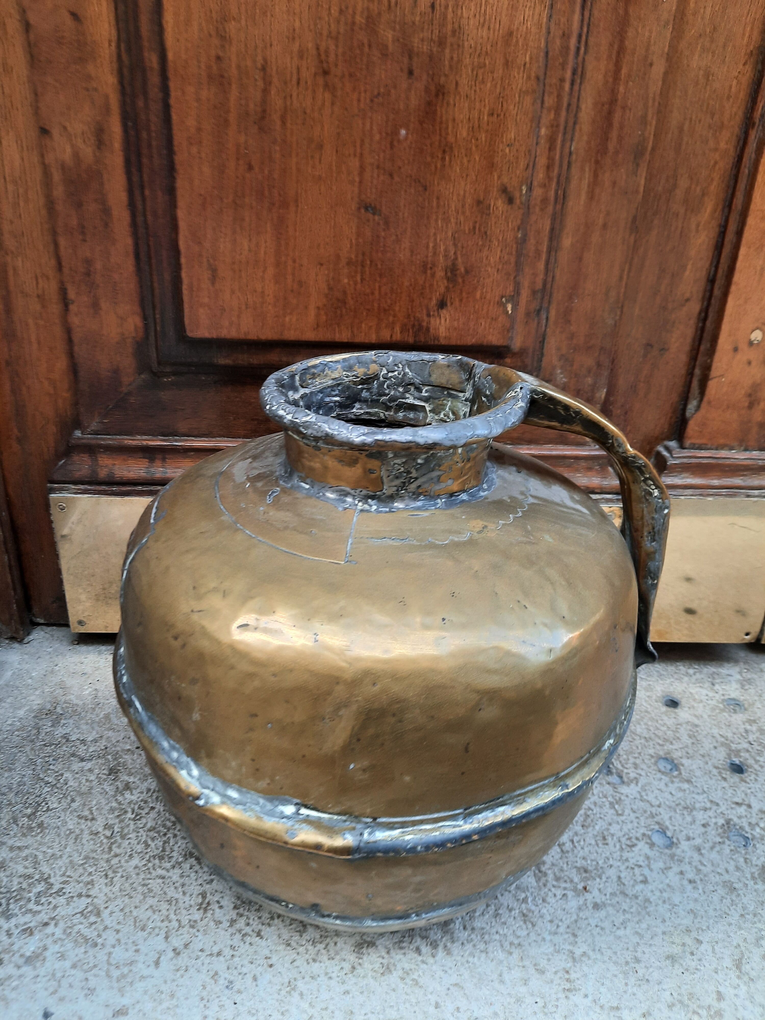 Antique brass jar