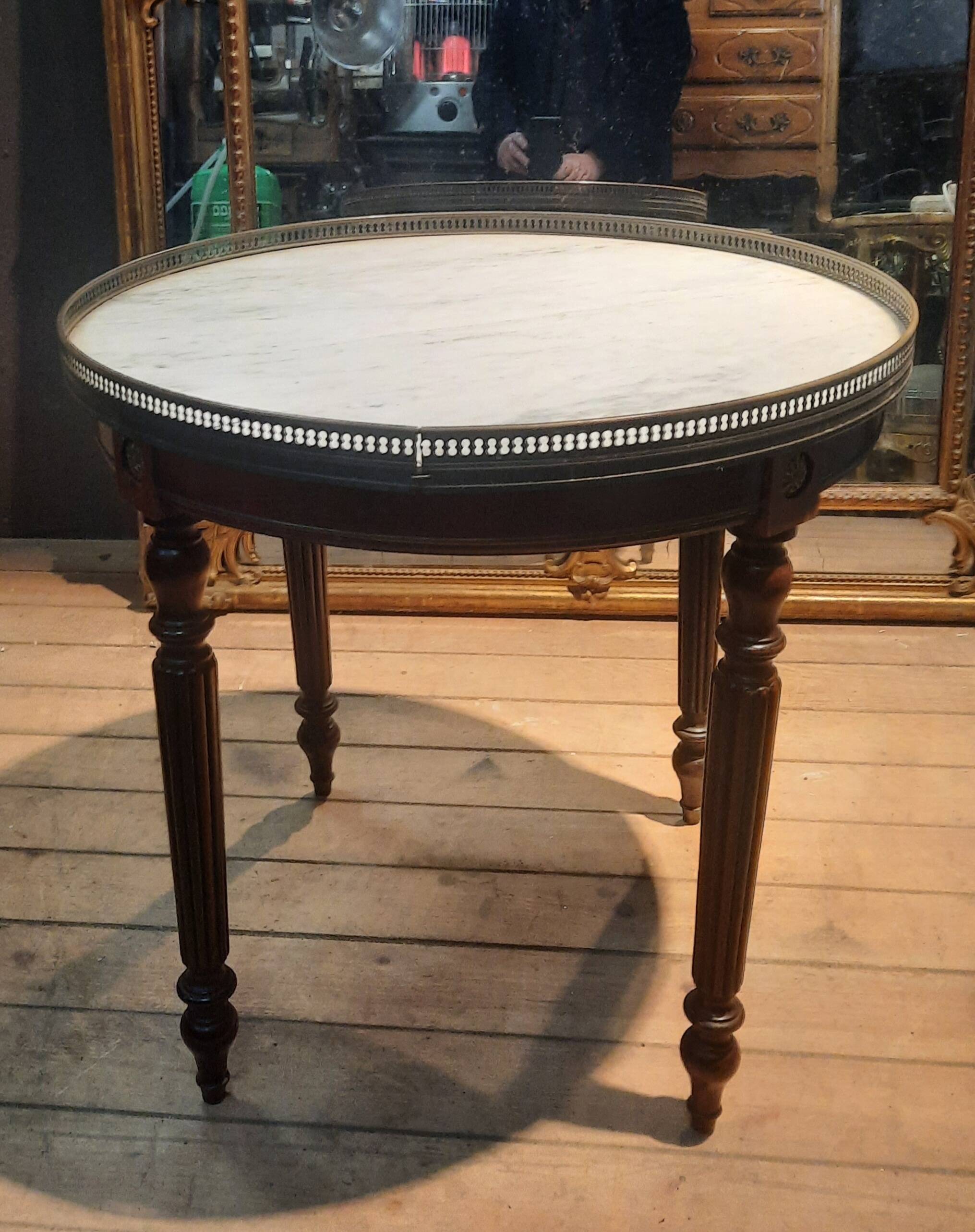 Coffee table with a marble top, known as "bouillotte".