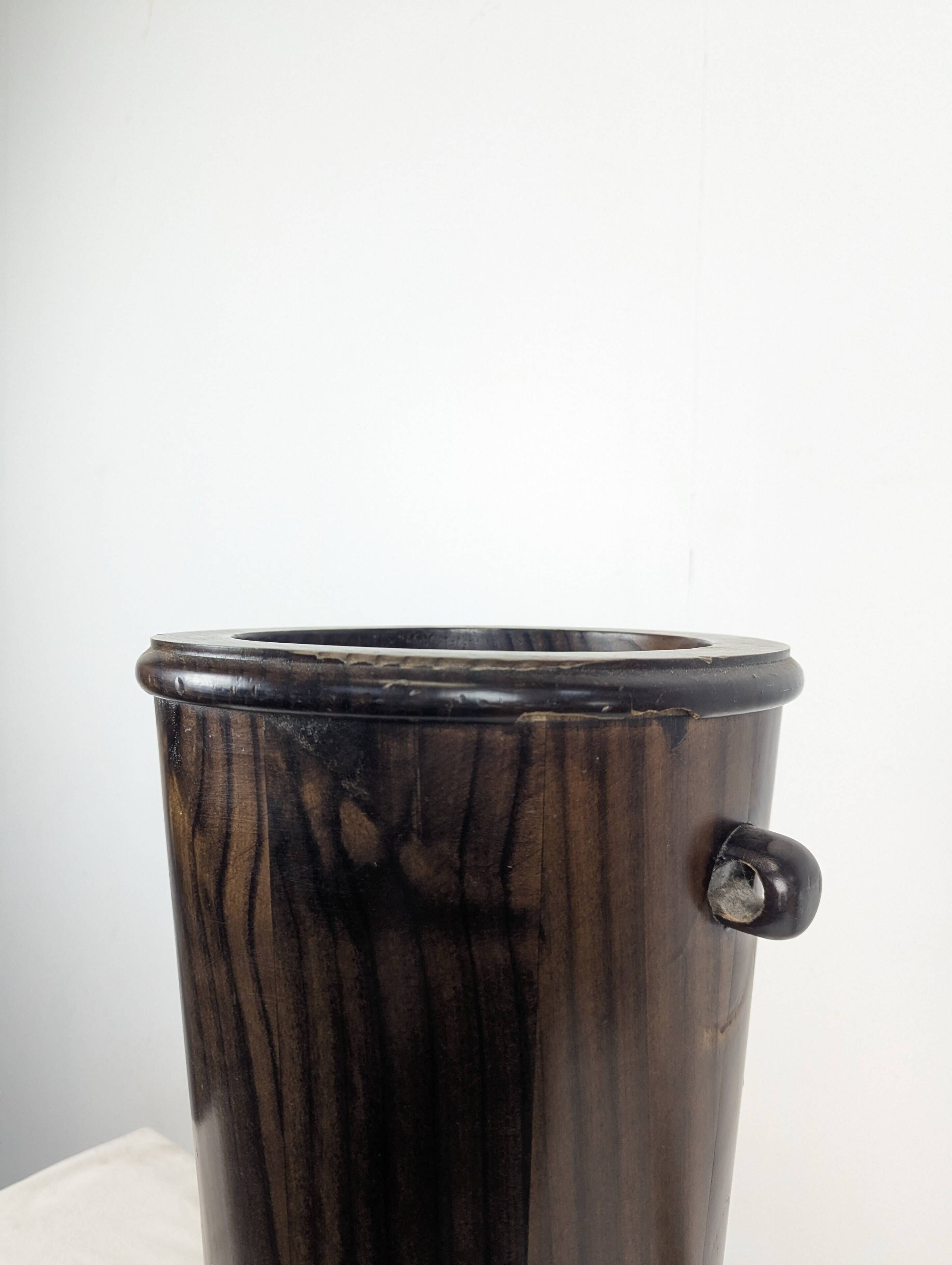 Wooden umbrella stand turned and patinated with iron rings