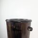 Wooden umbrella stand turned and patinated with iron rings