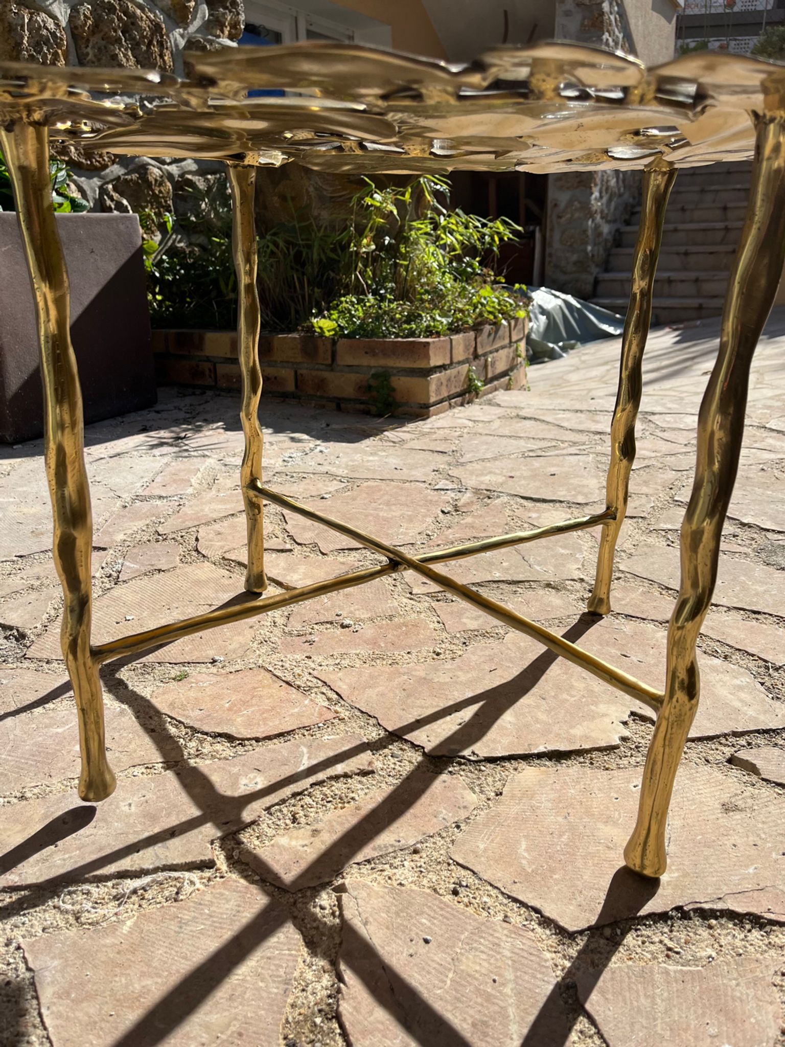 Carved brass coffee table with ginkgo decor
