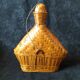 Vintage wicker and braided bamboo bottle
