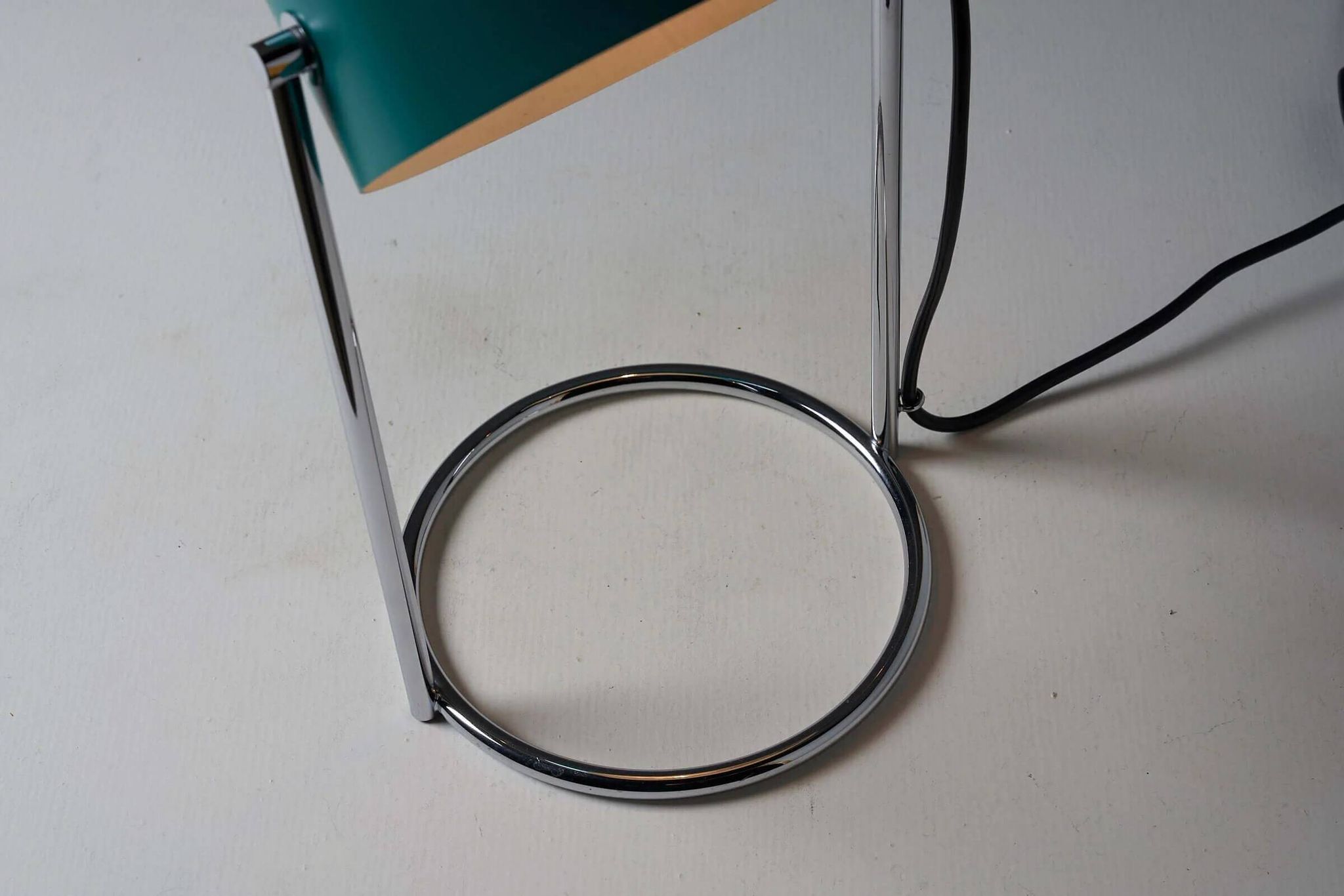 Petrol green table lamp with chromed steel base