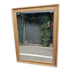 17th century Italian style gilded mirror in carved wood.