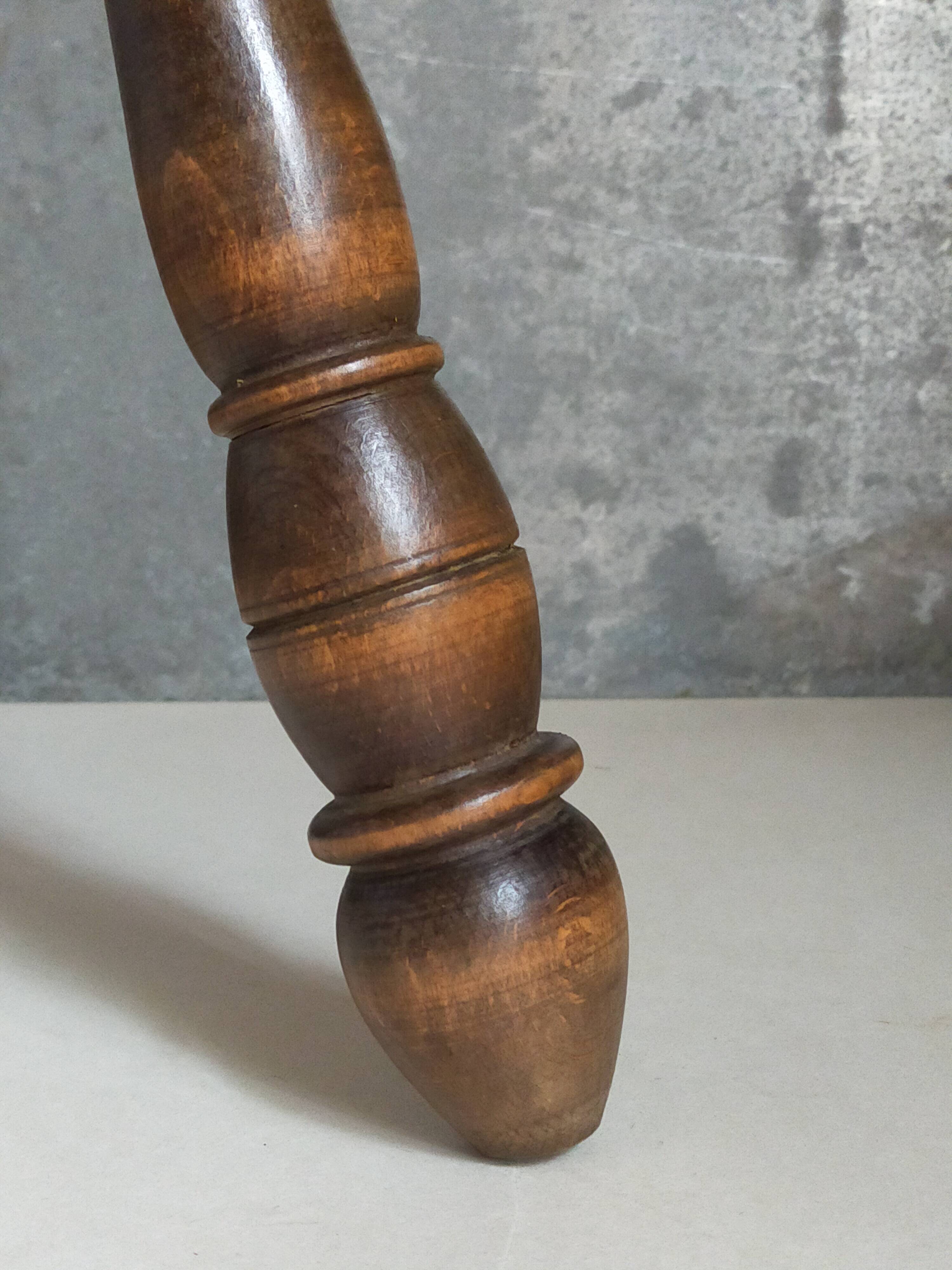 Low tripod stool in vintage turned solid wood