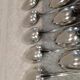 12 silver-plated metal teaspoons by Apollo silversmiths, decorated with fillets, 14.2cm