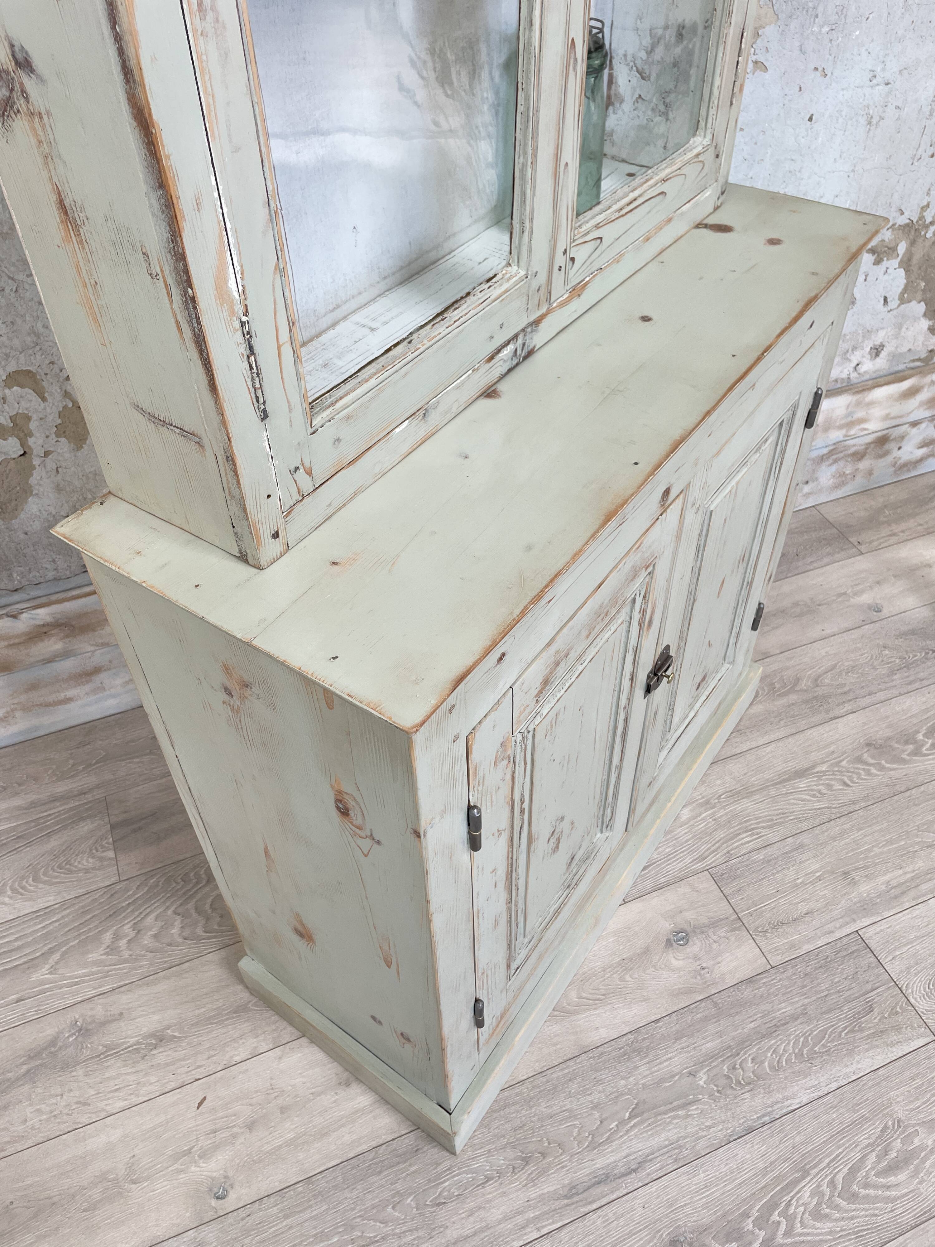 Furniture two body showcase, around 1900.