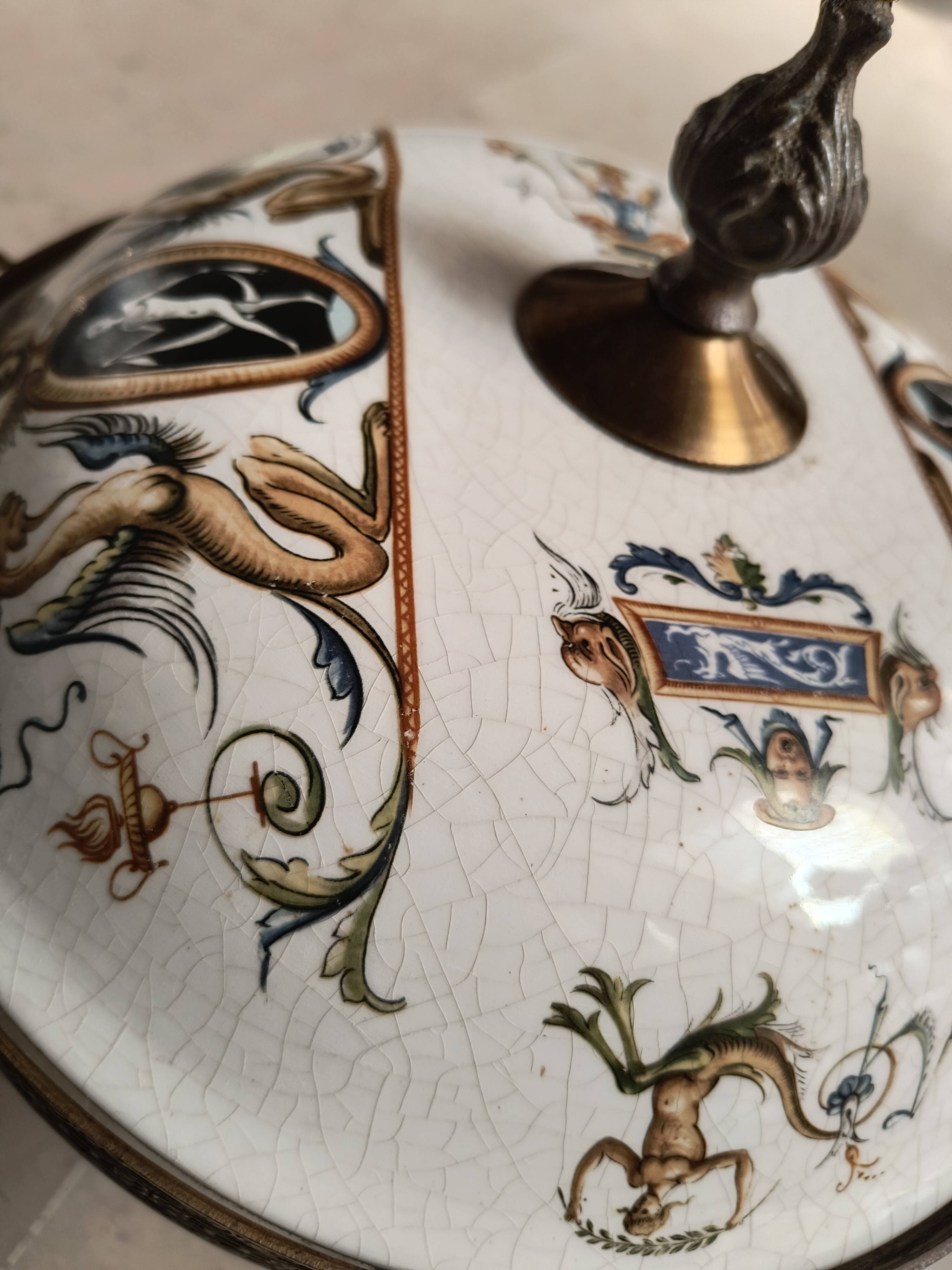Lustrous bronze, copper and gien-style earthenware.