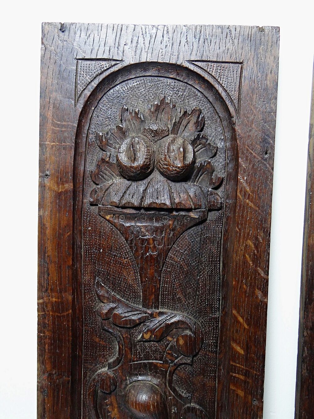 Pair of decorative wall panels in carved wood from the 19th century.