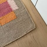 Jute rug with pink and orange patterns Matias Moellenbach