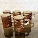 Set of 5 stoneware cups.
