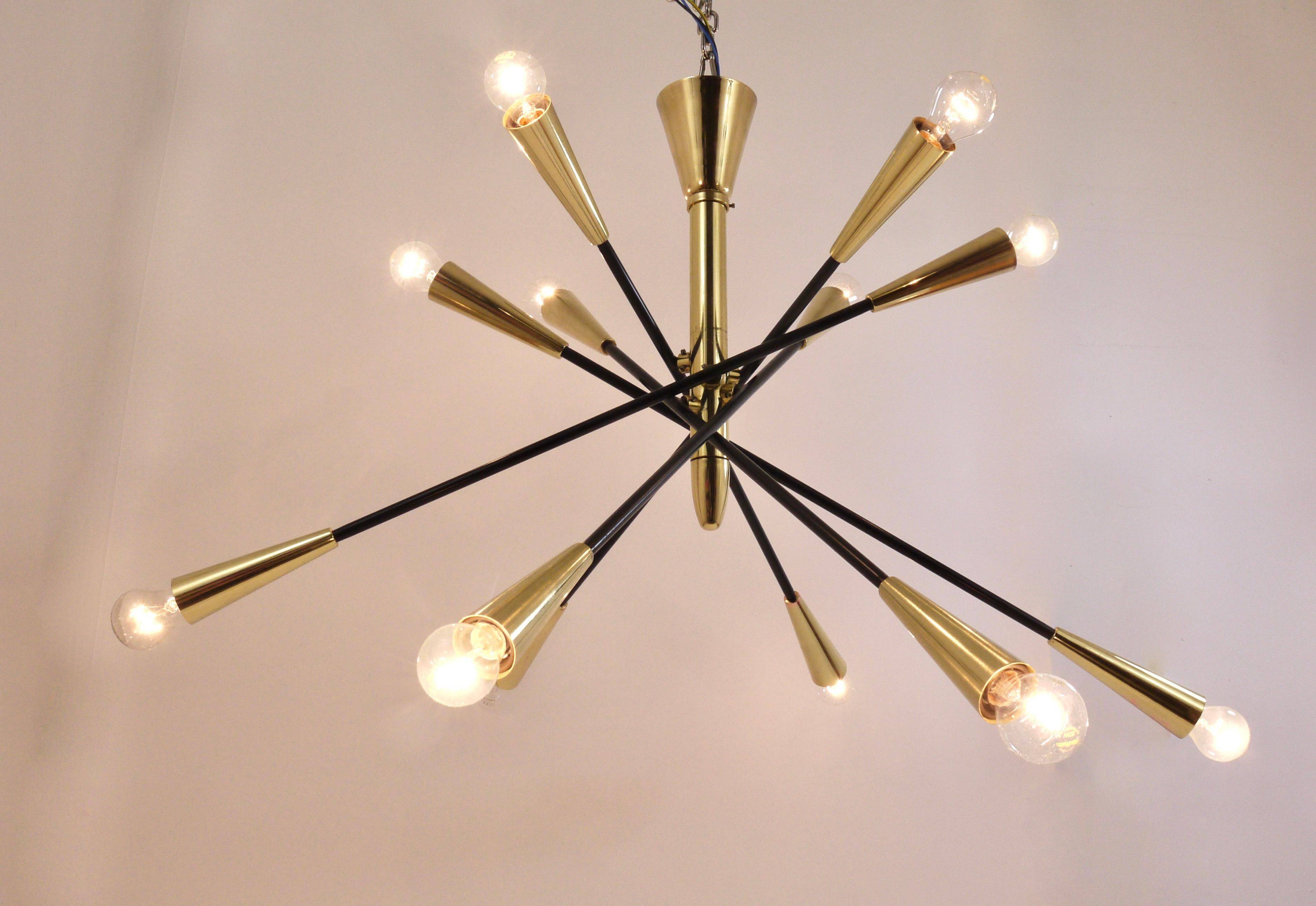 Black and brass articulated Sputnik chandelier in Stilnovo style, Italy, 1950.