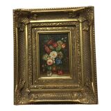 Oil on panel in the center of a frame